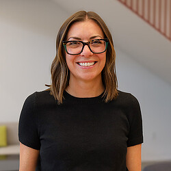 A person wearing glasses.