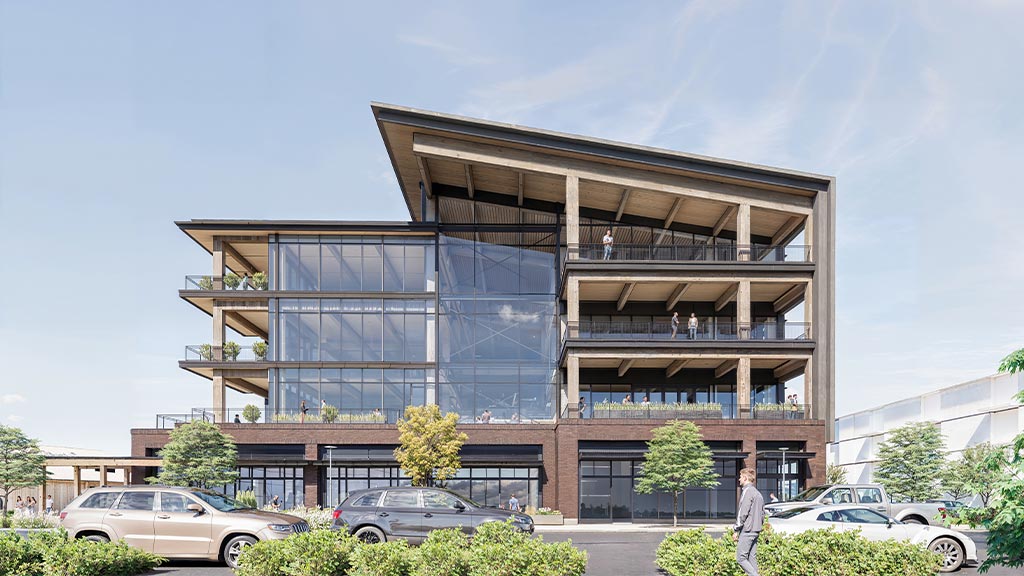 A building with cars parked outside.