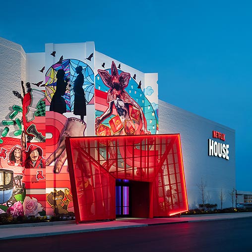 A building with a mural on it.