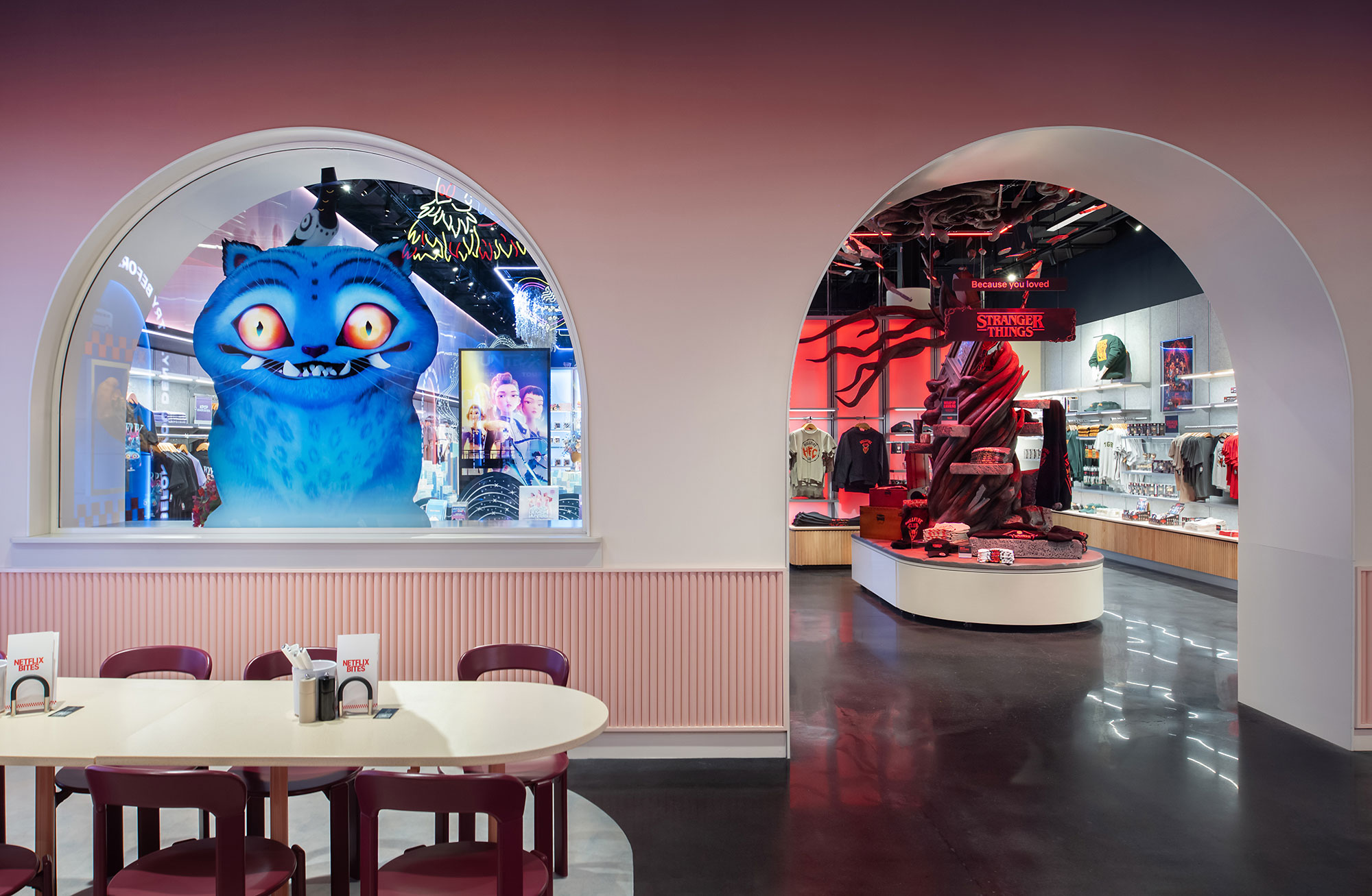 A room with a table and chairs.