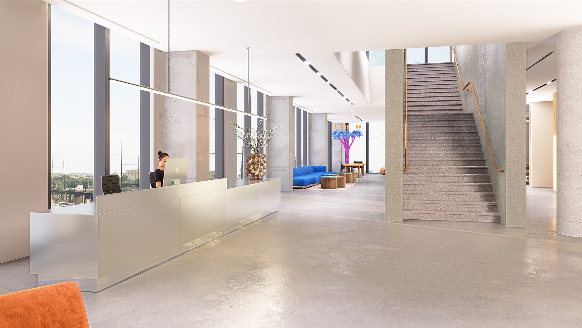 A person standing in a large room.