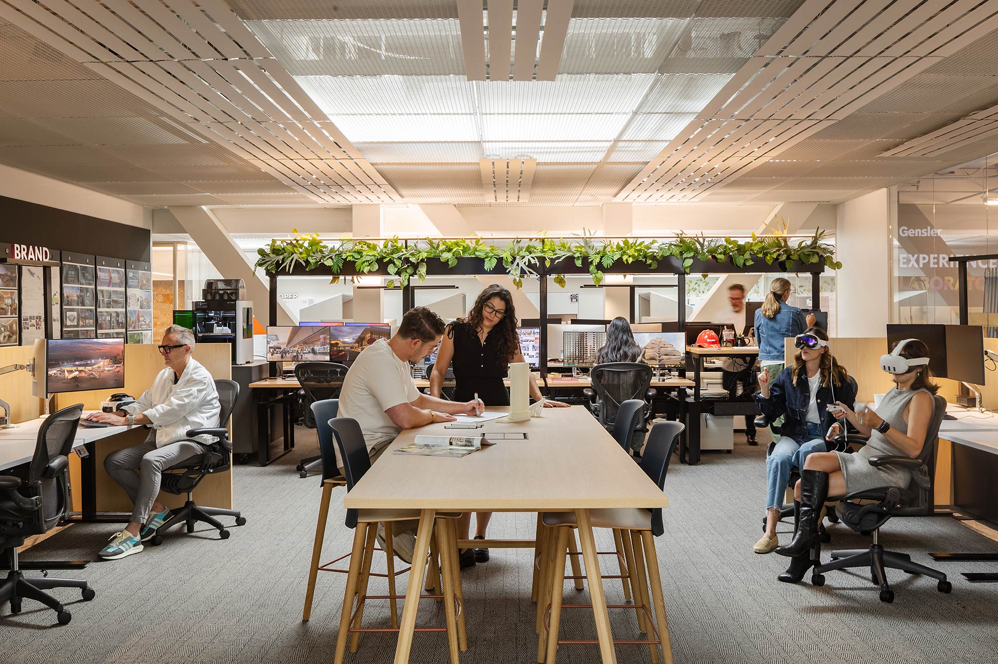 A group of people sitting at a table.