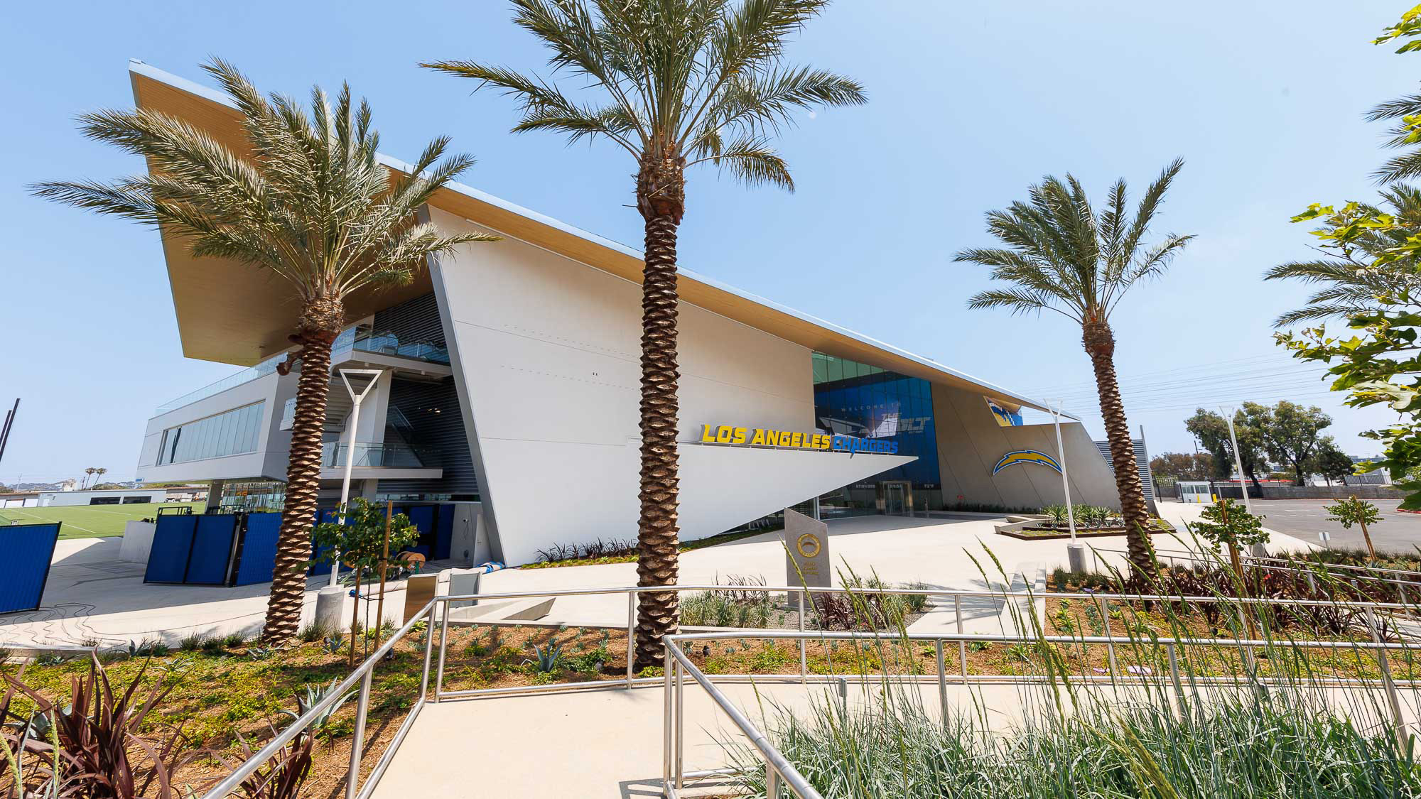 A building with palm trees.