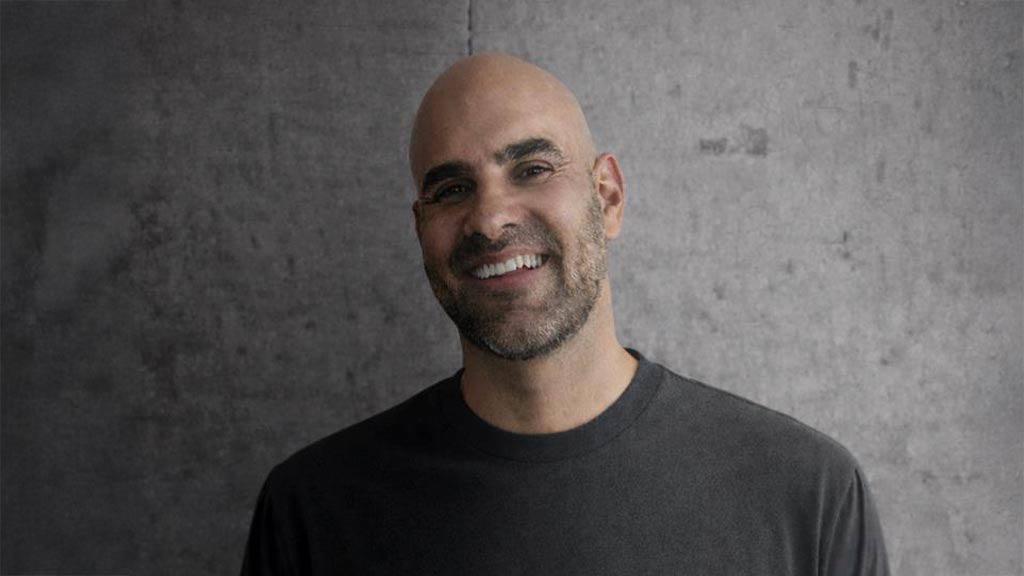 A man smiling for the camera.