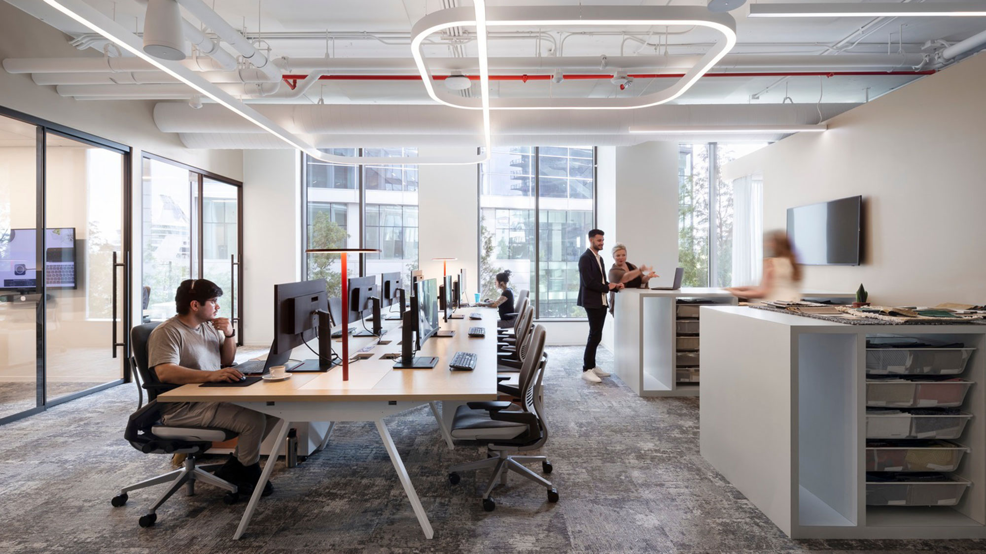 A group of people in an office.