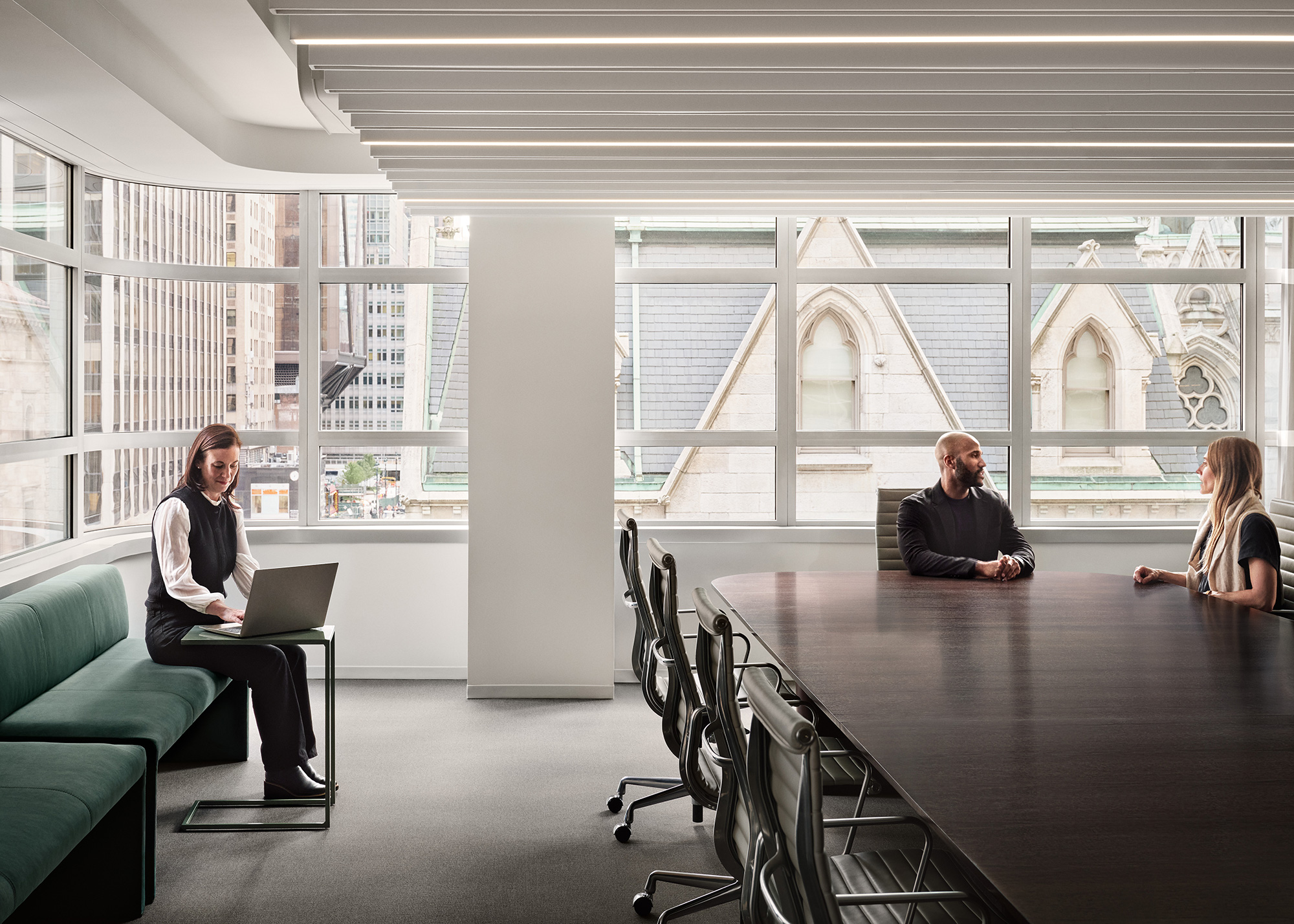 A few people sitting at a table.