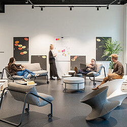 A group of people in a room.