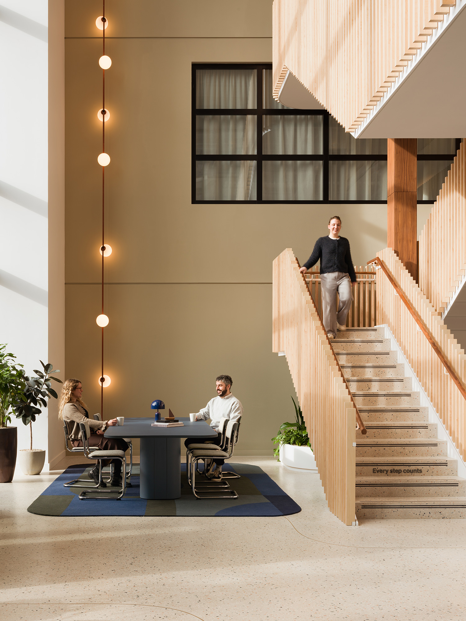 A few people sitting at a table.