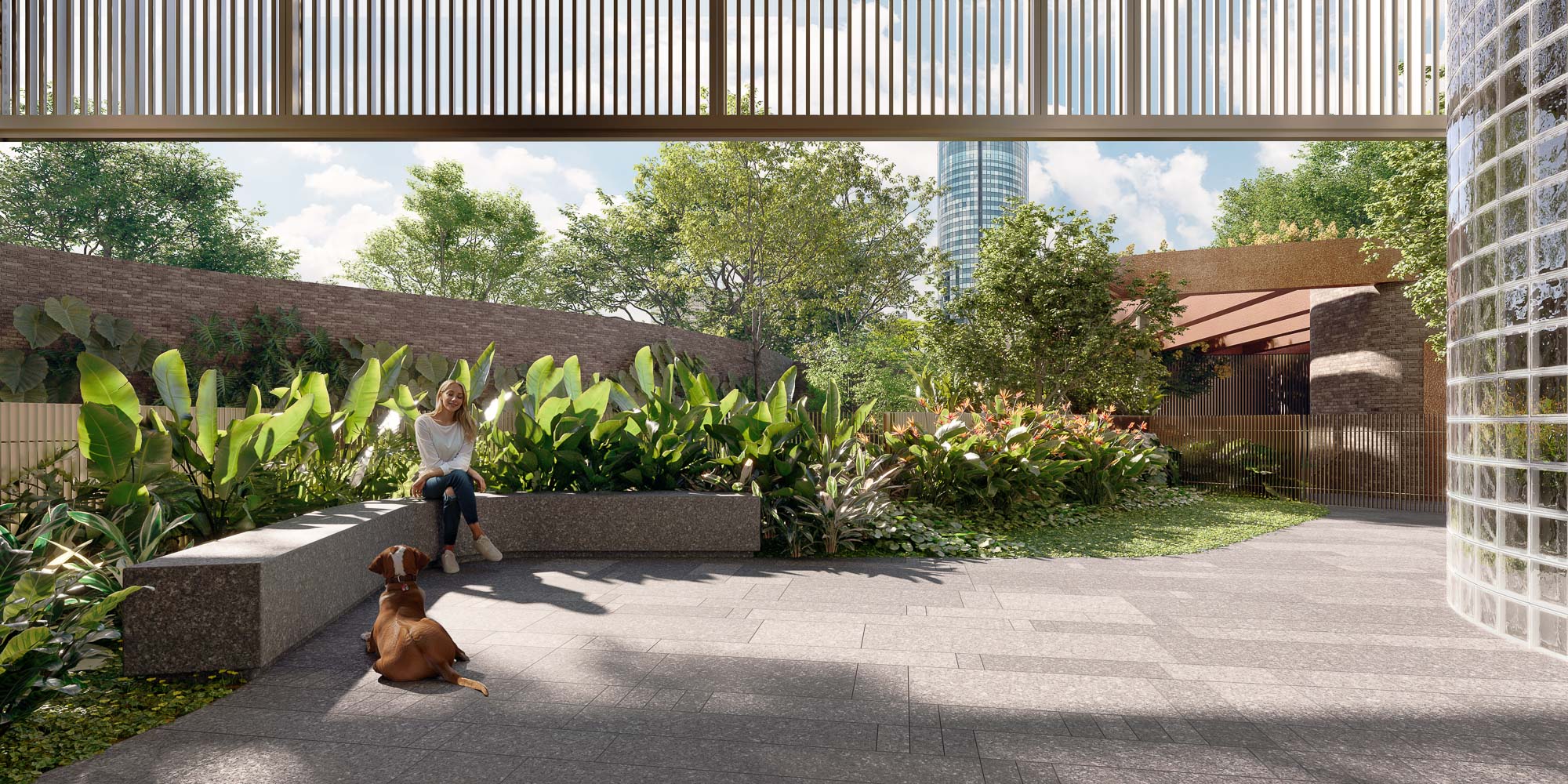 A person sitting on a bench with a dog.