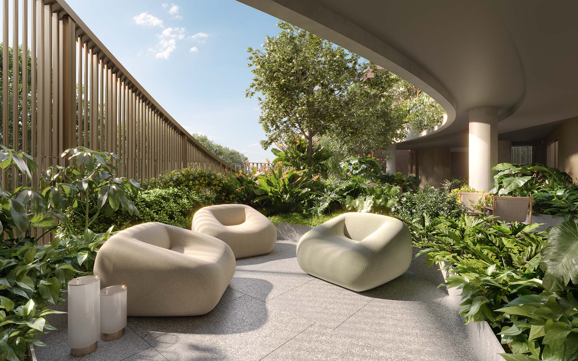 A patio with a few white couches and a wood fence.