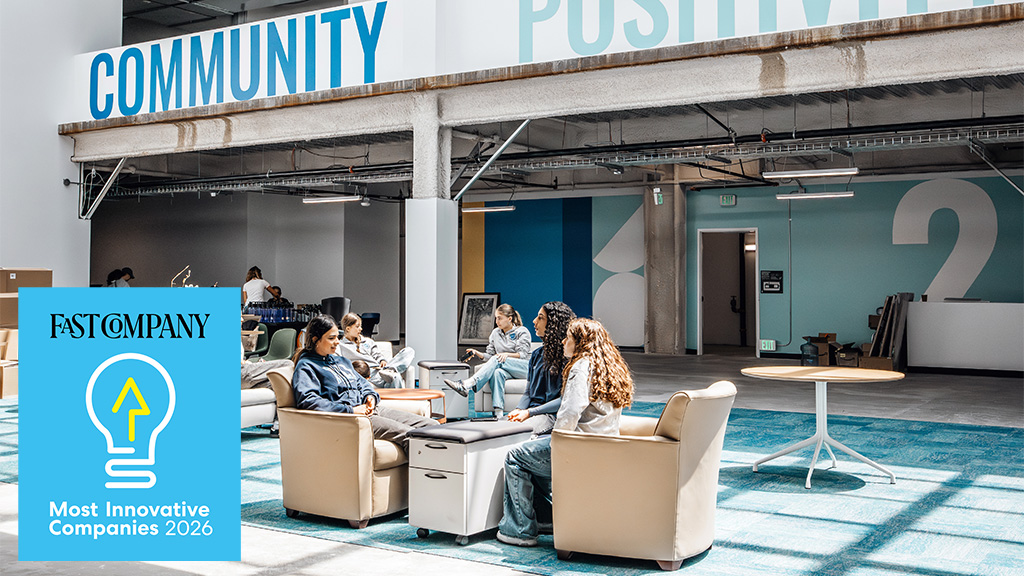 A group of people sitting in a room.
