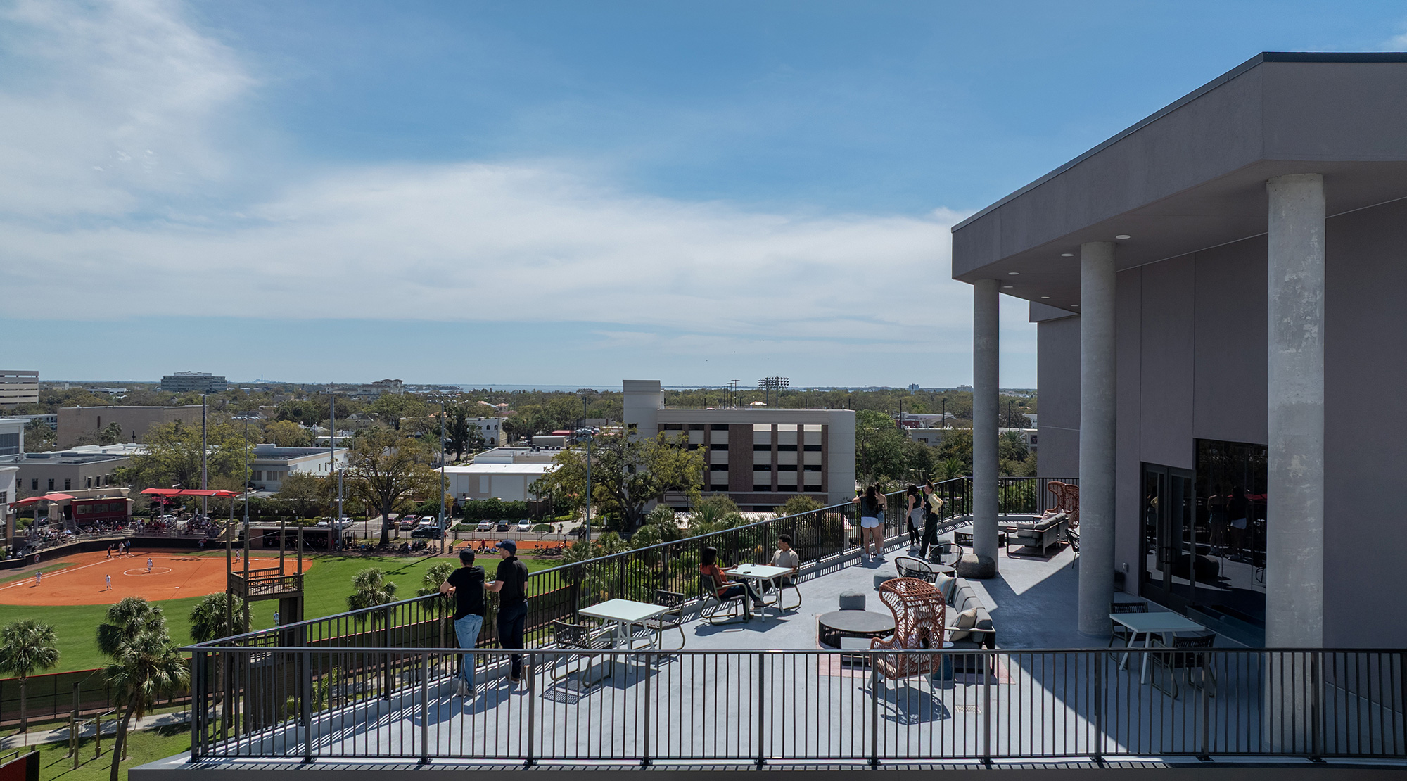 A group of people outside a building.