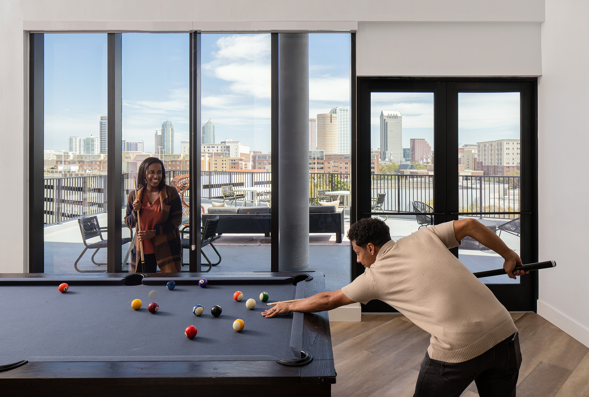 A person playing pool.