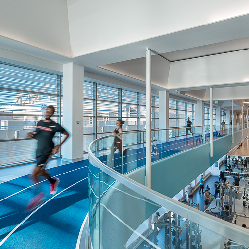 A person running on a swimming pool.