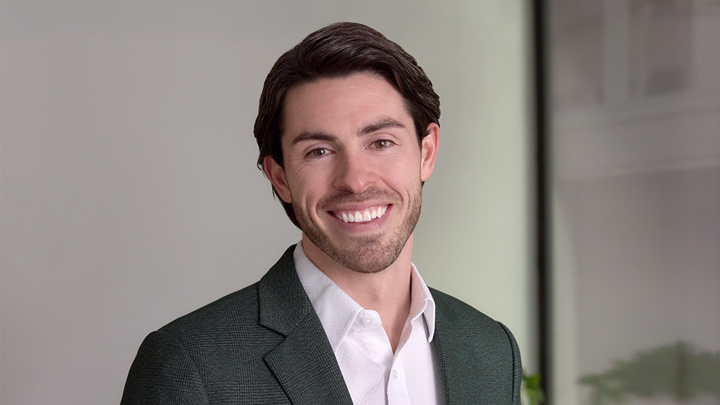 A man smiling for the camera.