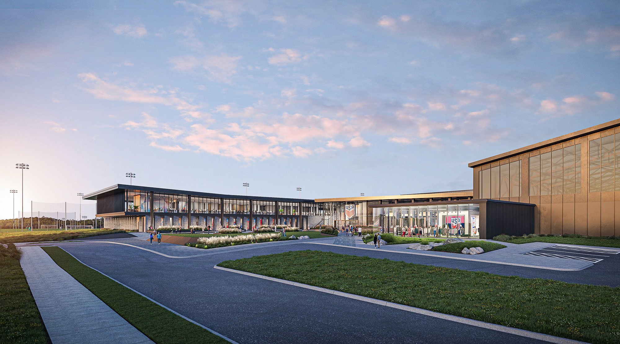 A building with a walkway and grass.