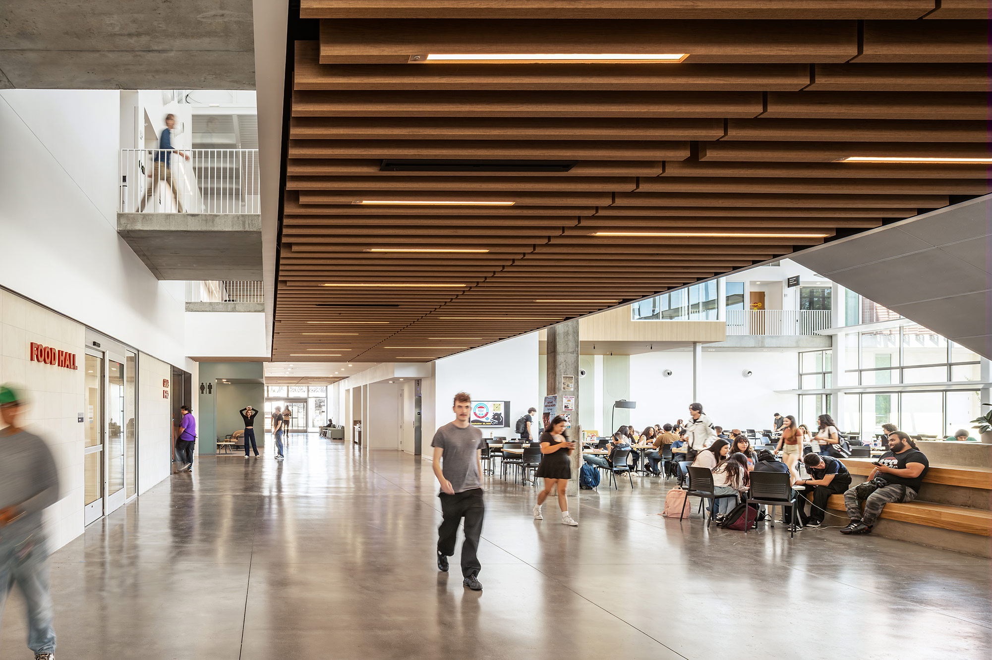 A group of people in a building.