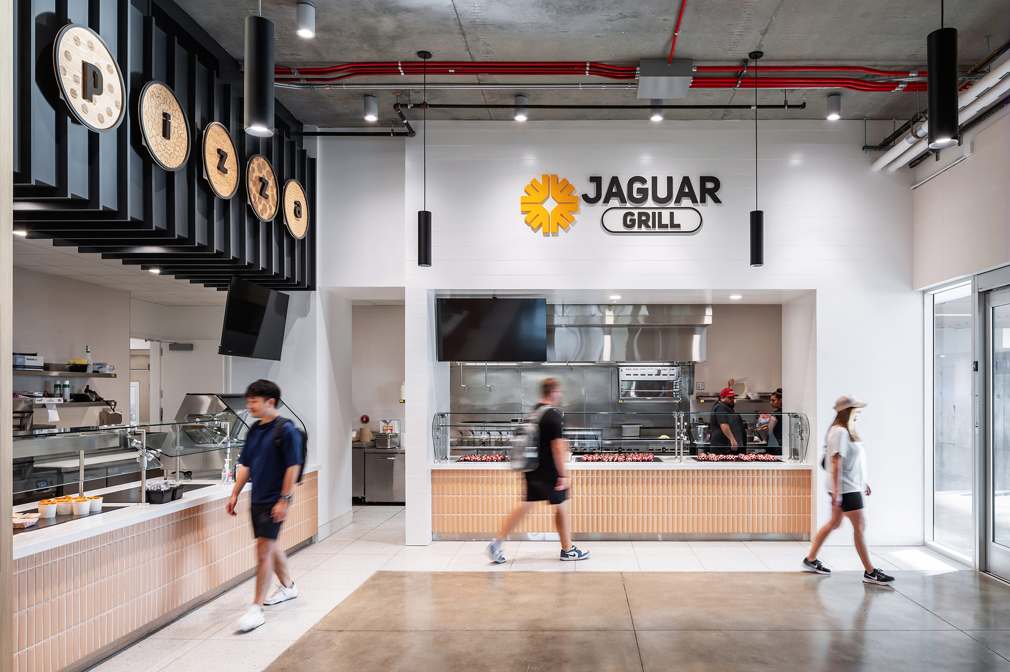 People walking in a building.