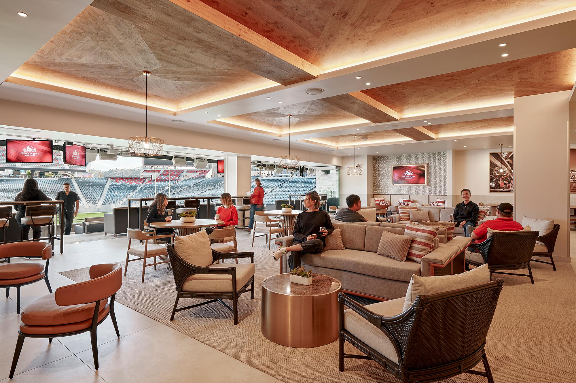 A group of people sitting at tables.