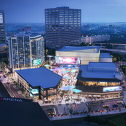 A city with a large crowd of people and buildings.