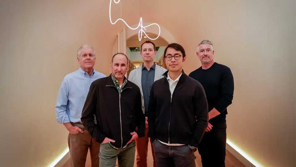 A group of men posing for a photo.