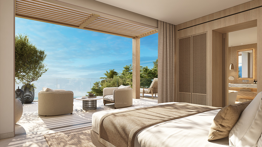 A bedroom with a large window.