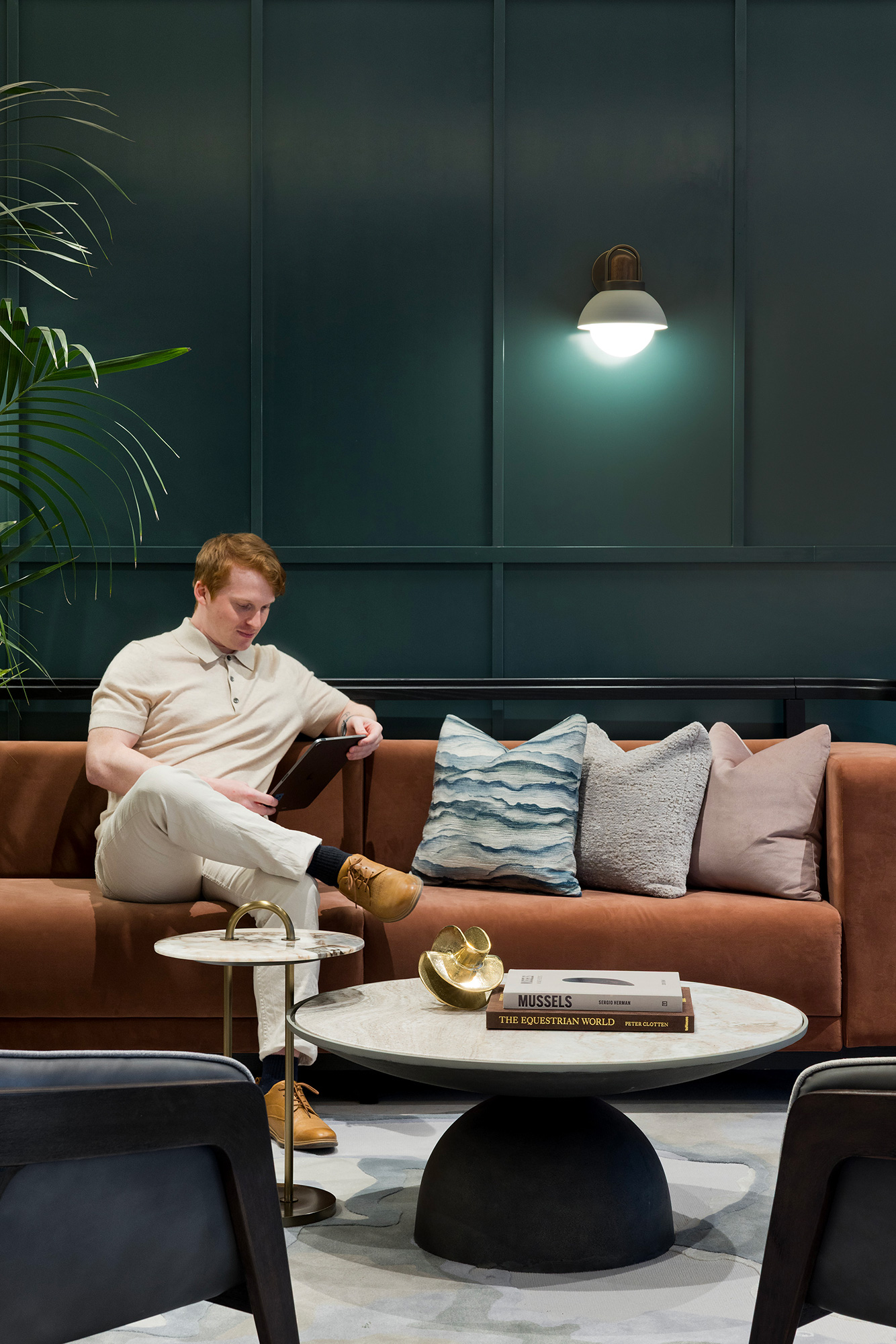 A person sitting on a couch.