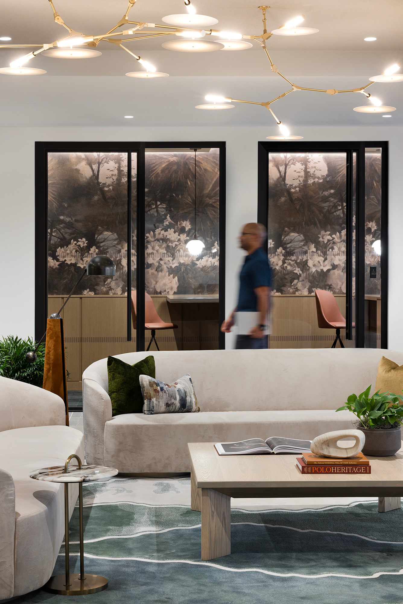 A person standing in a living room.