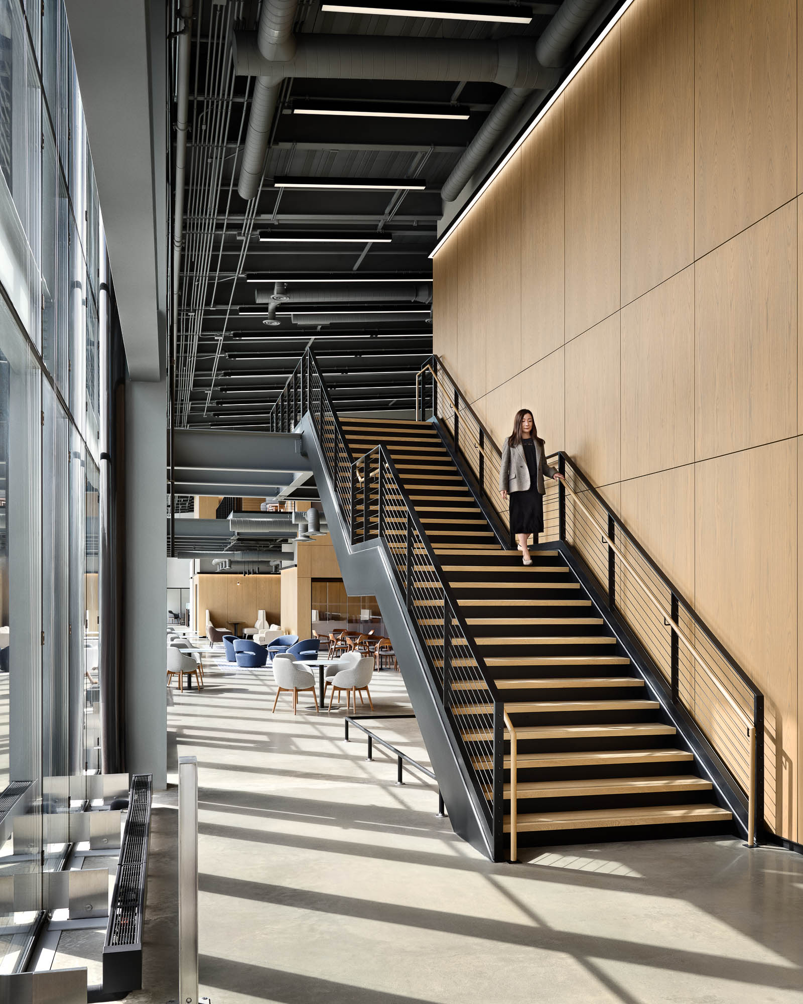 A person standing on a staircase.