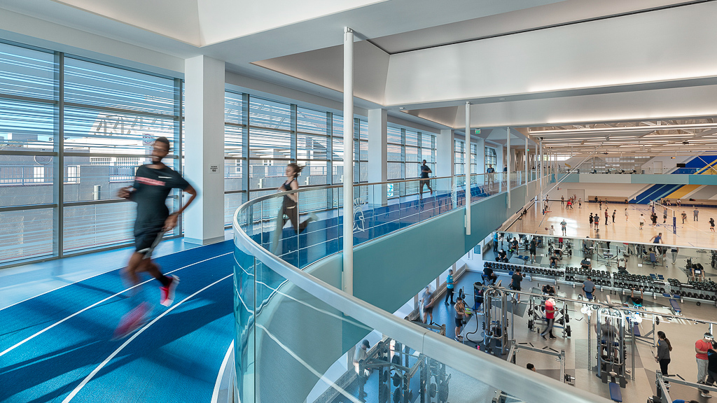 A person running on a track.