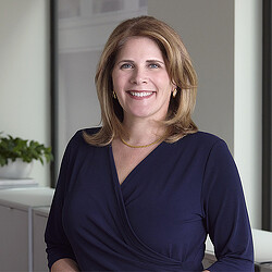 A person in a blue shirt.