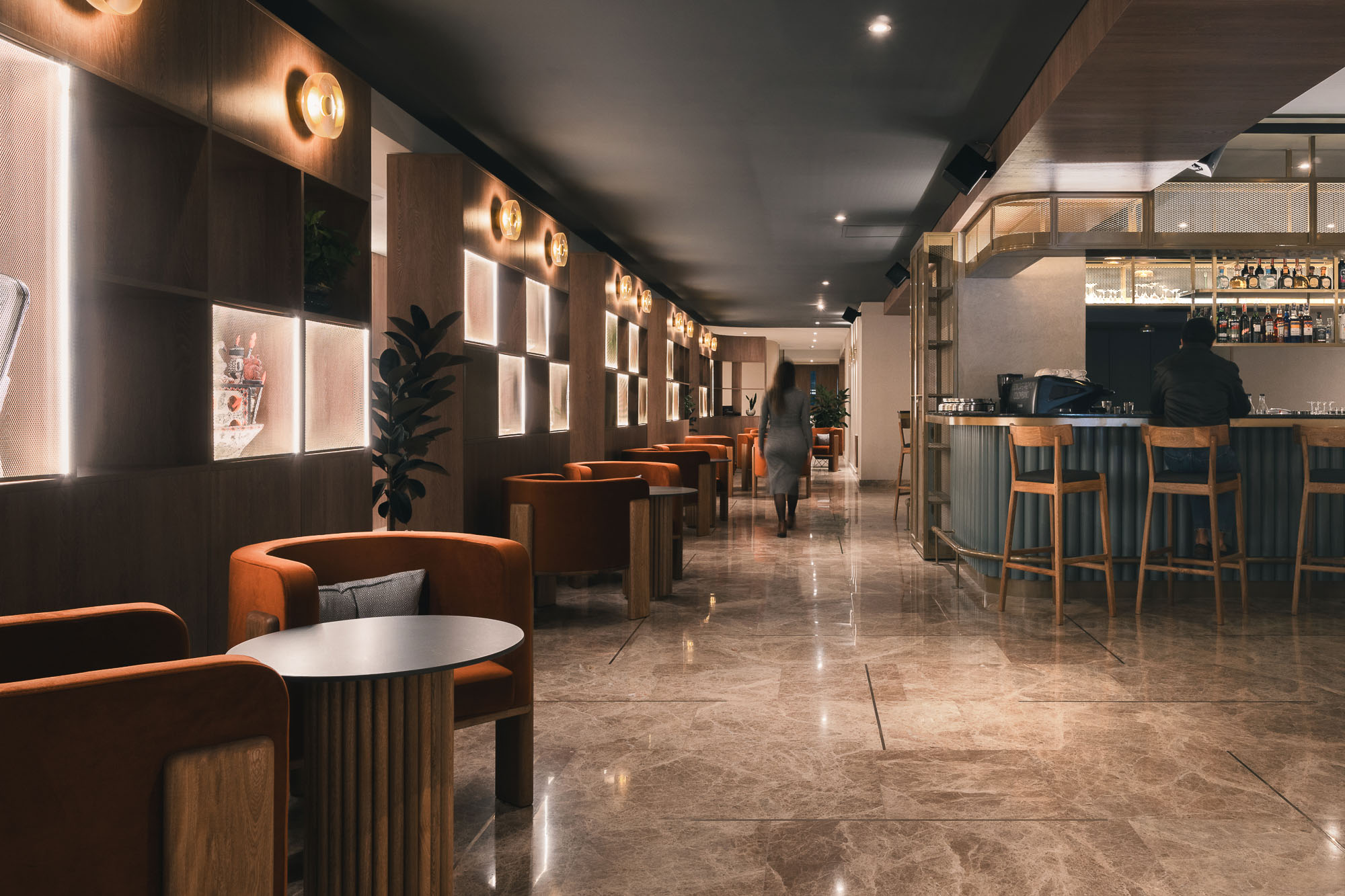 A room with tables and chairs.