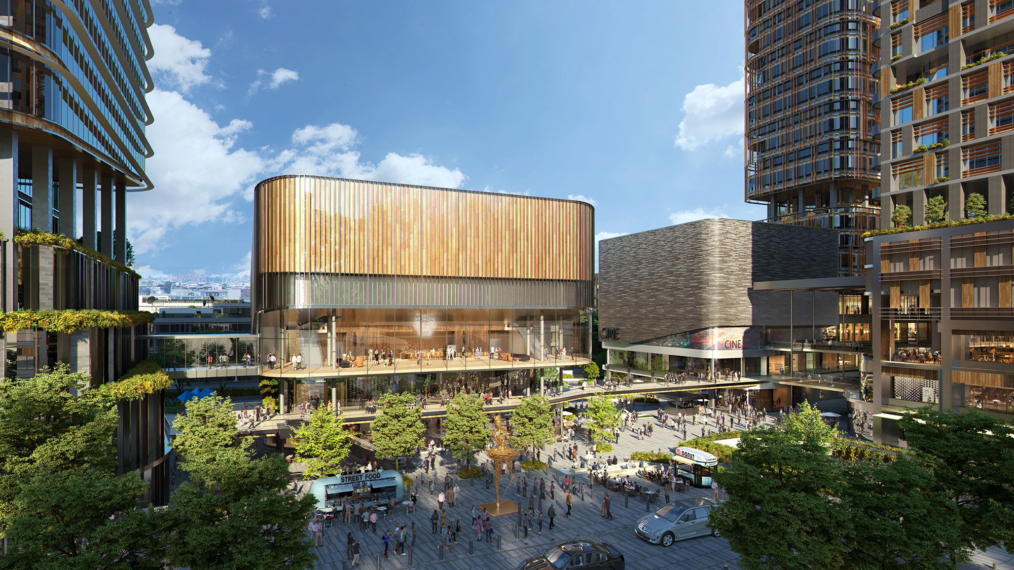 A large building with a courtyard and people walking around.