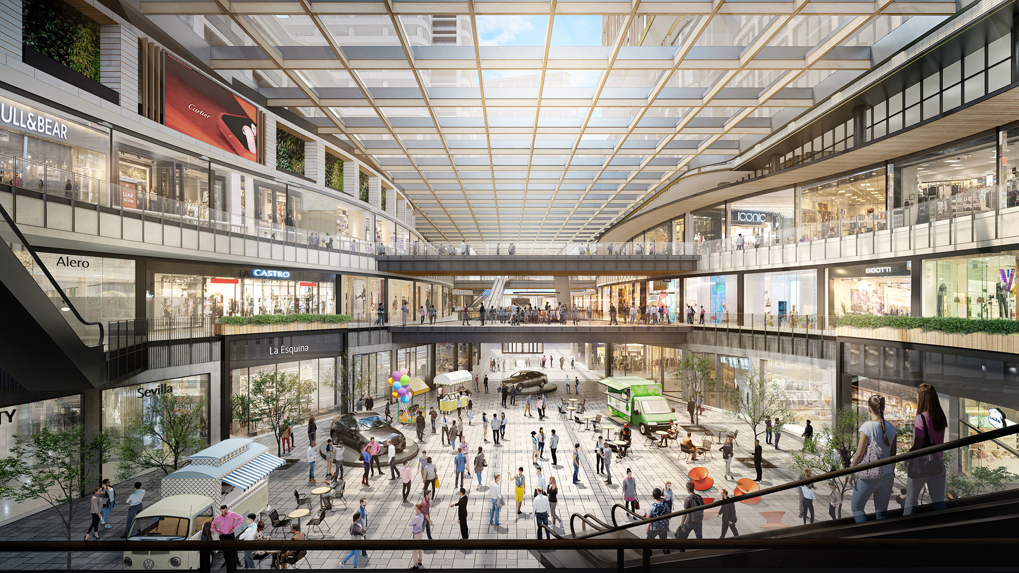 A large group of people walking inside a building.