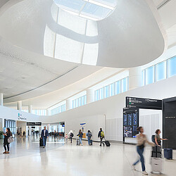 A group of people in a large building.