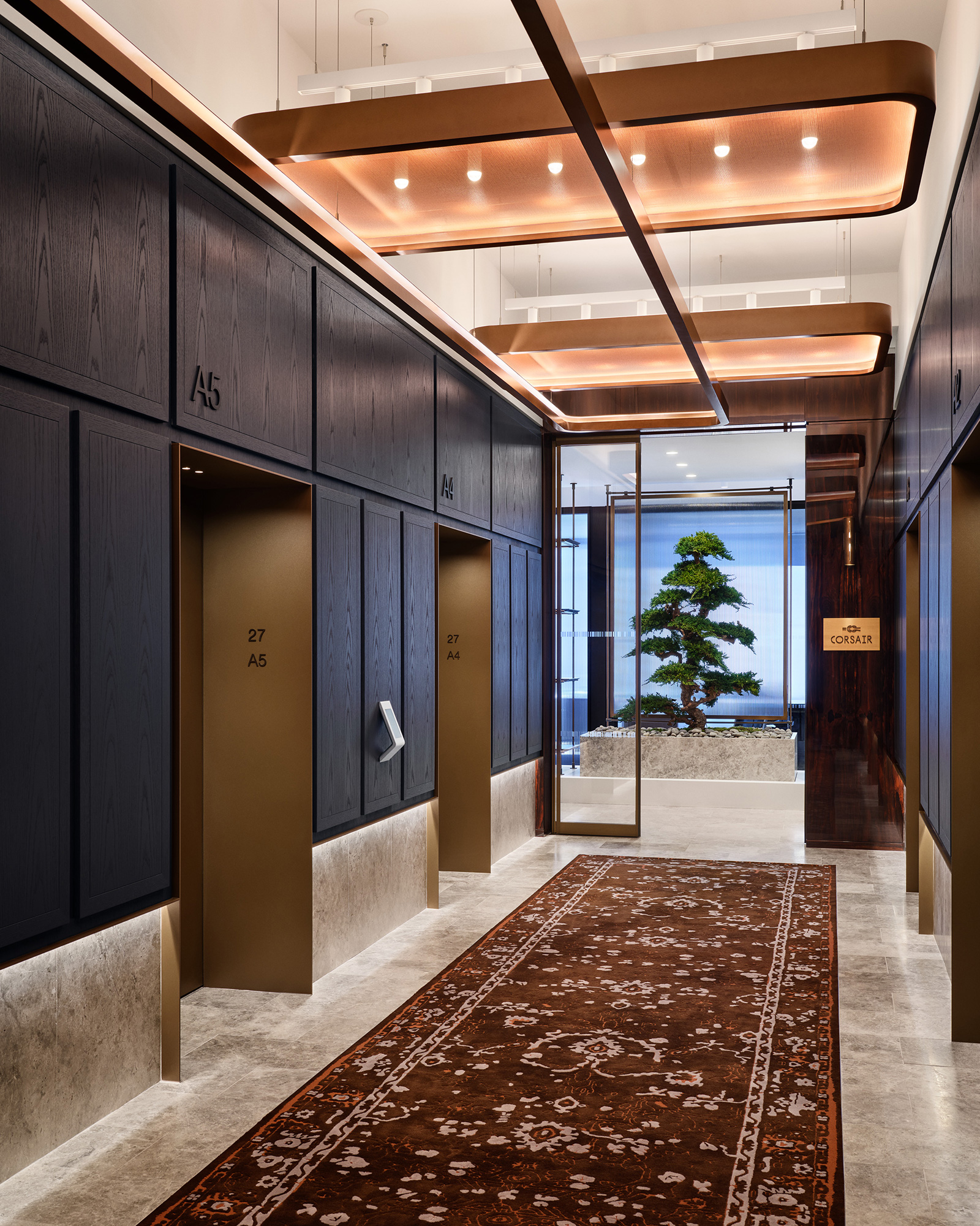 A hallway with black walls.