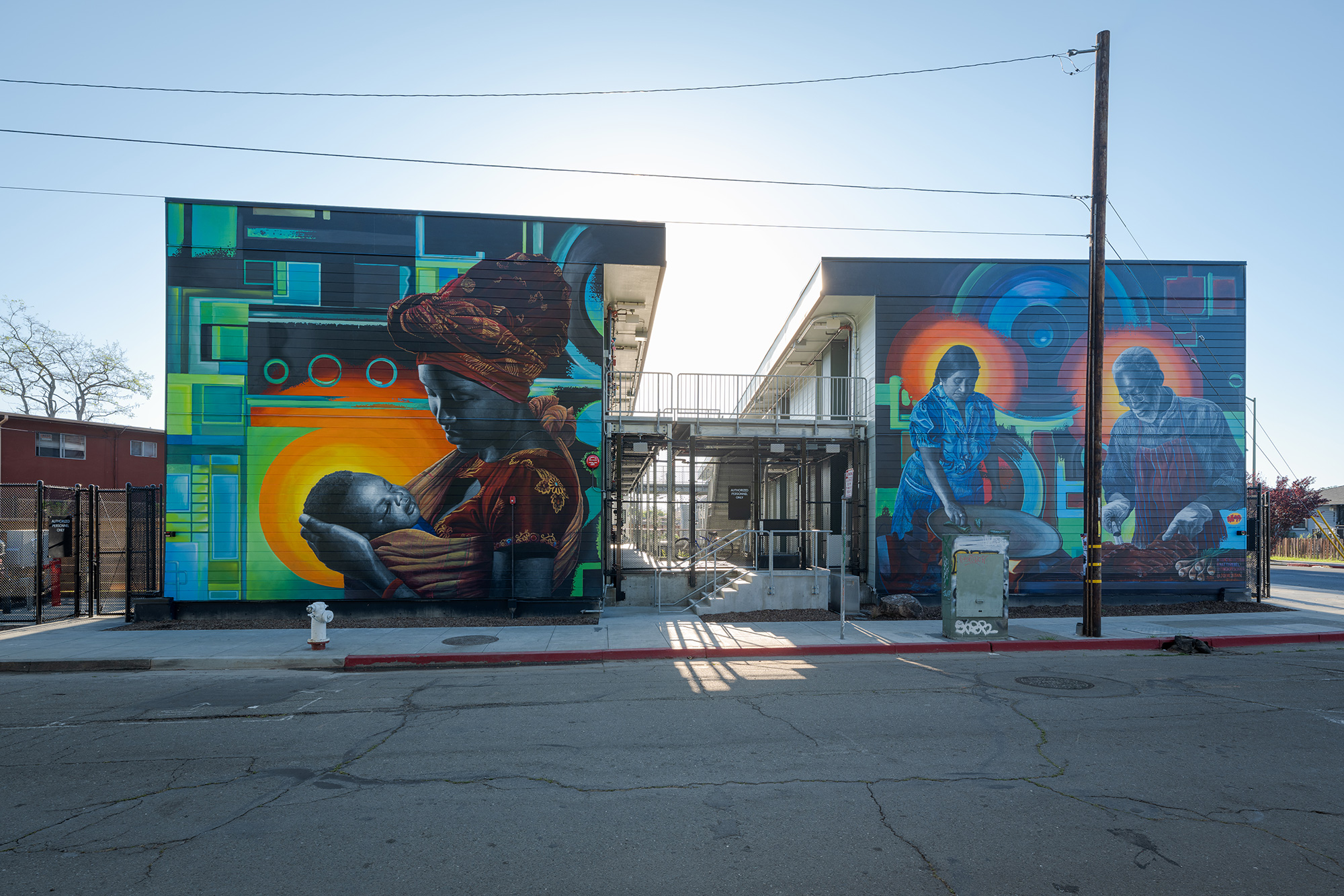 A building with a mural on it.