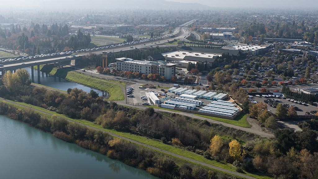 A large building next to a river.