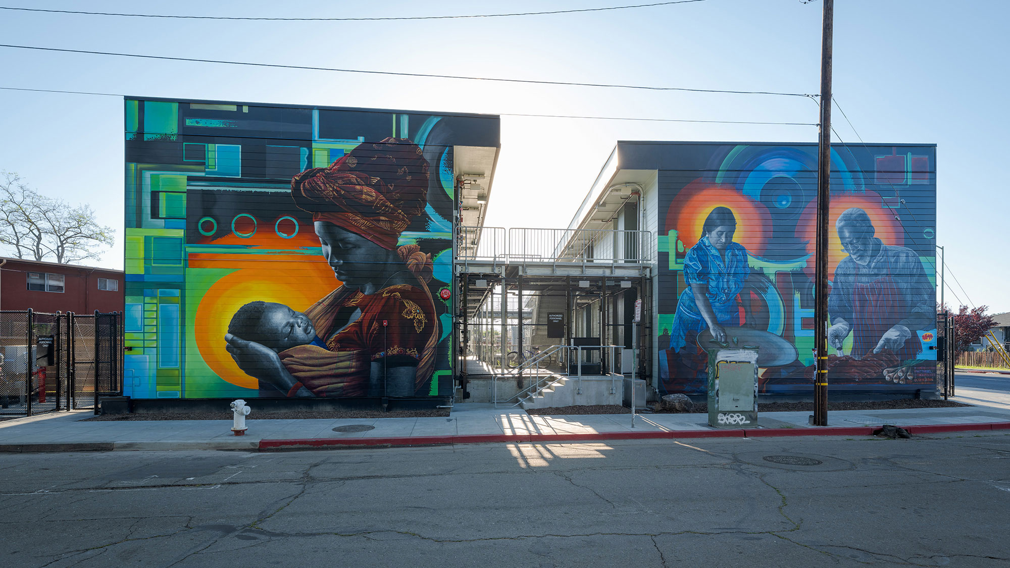 A building with a mural on it.