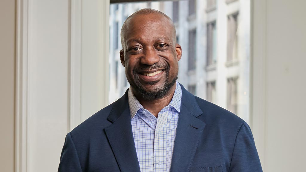 A man smiling for the camera.