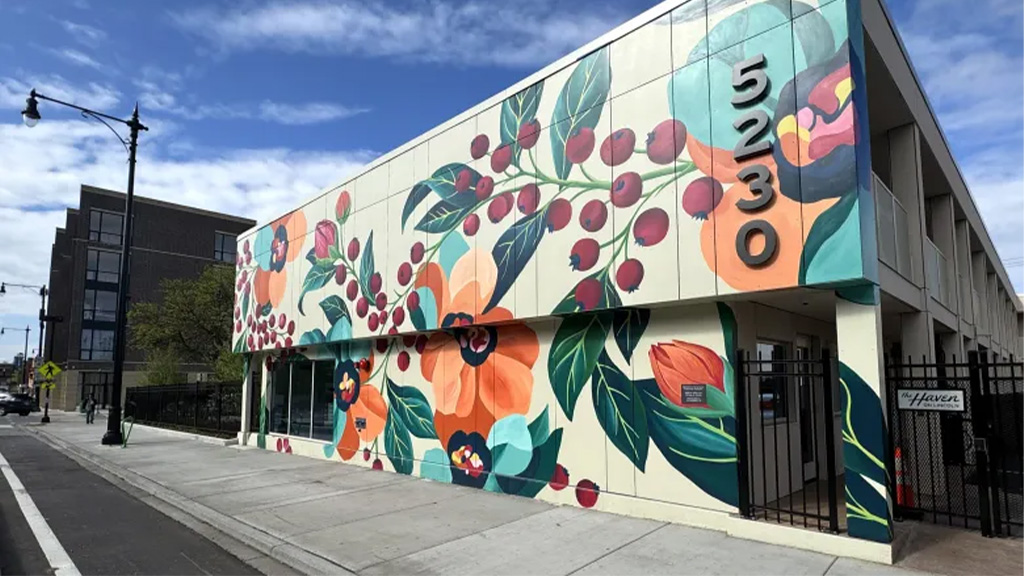 A building with a mural on it.