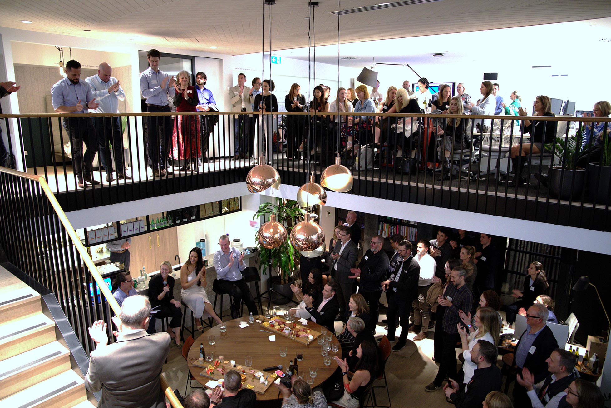 A group of people on a staircase.