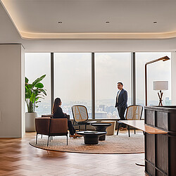 A man and woman in a room.