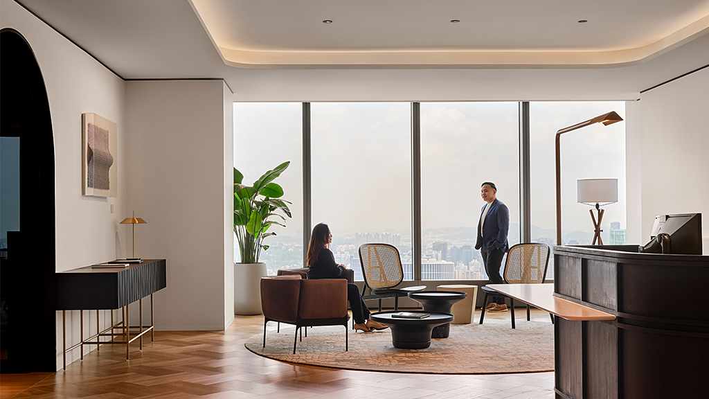 A man and woman in a room.