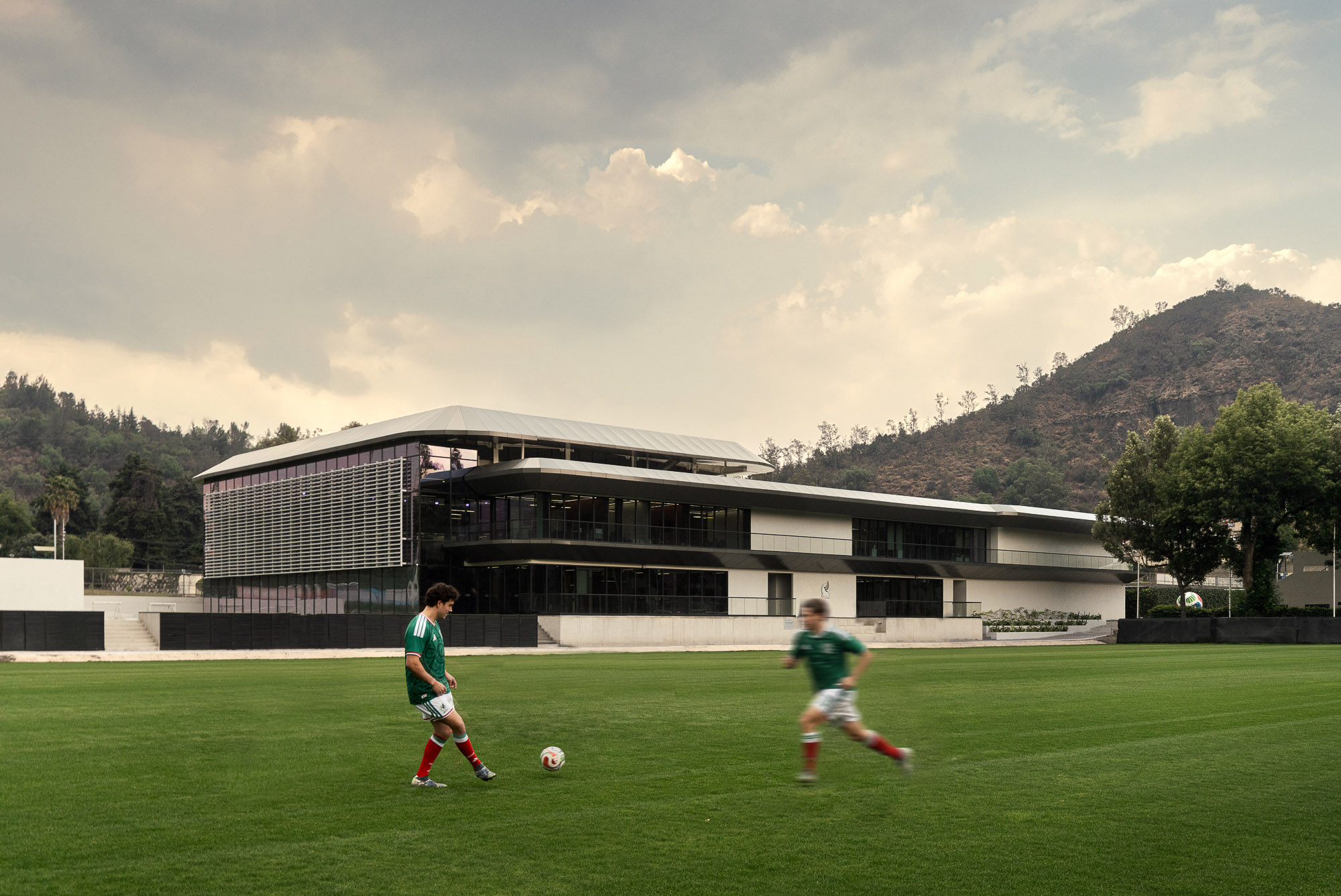 A couple of boys playing football.