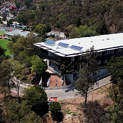 A building with a parking lot.