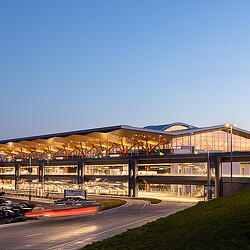 A building with a parking lot.