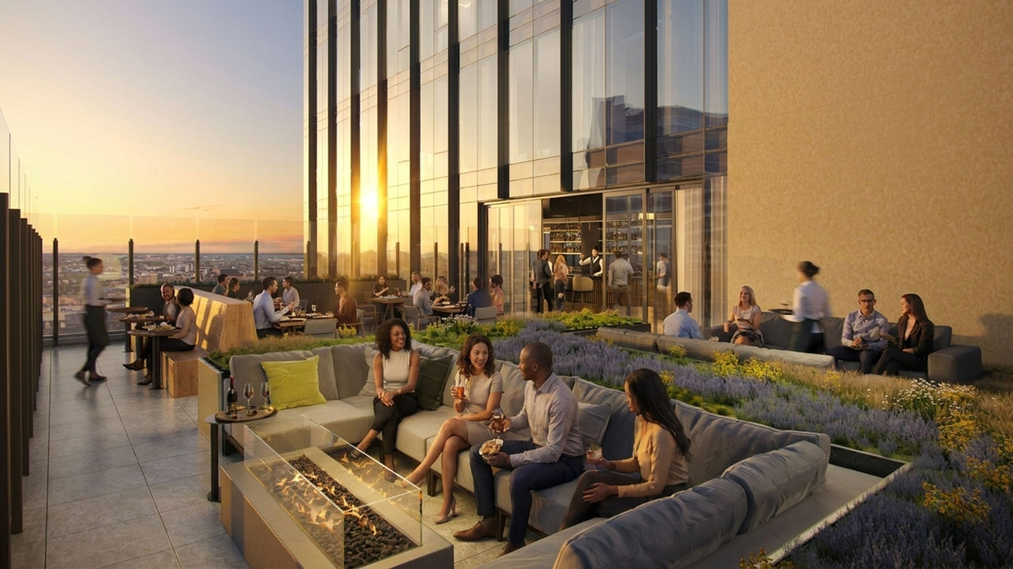 A group of people sitting on a couch in front of a building.