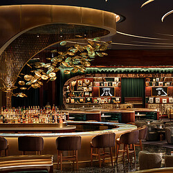 A bar with a chandelier.