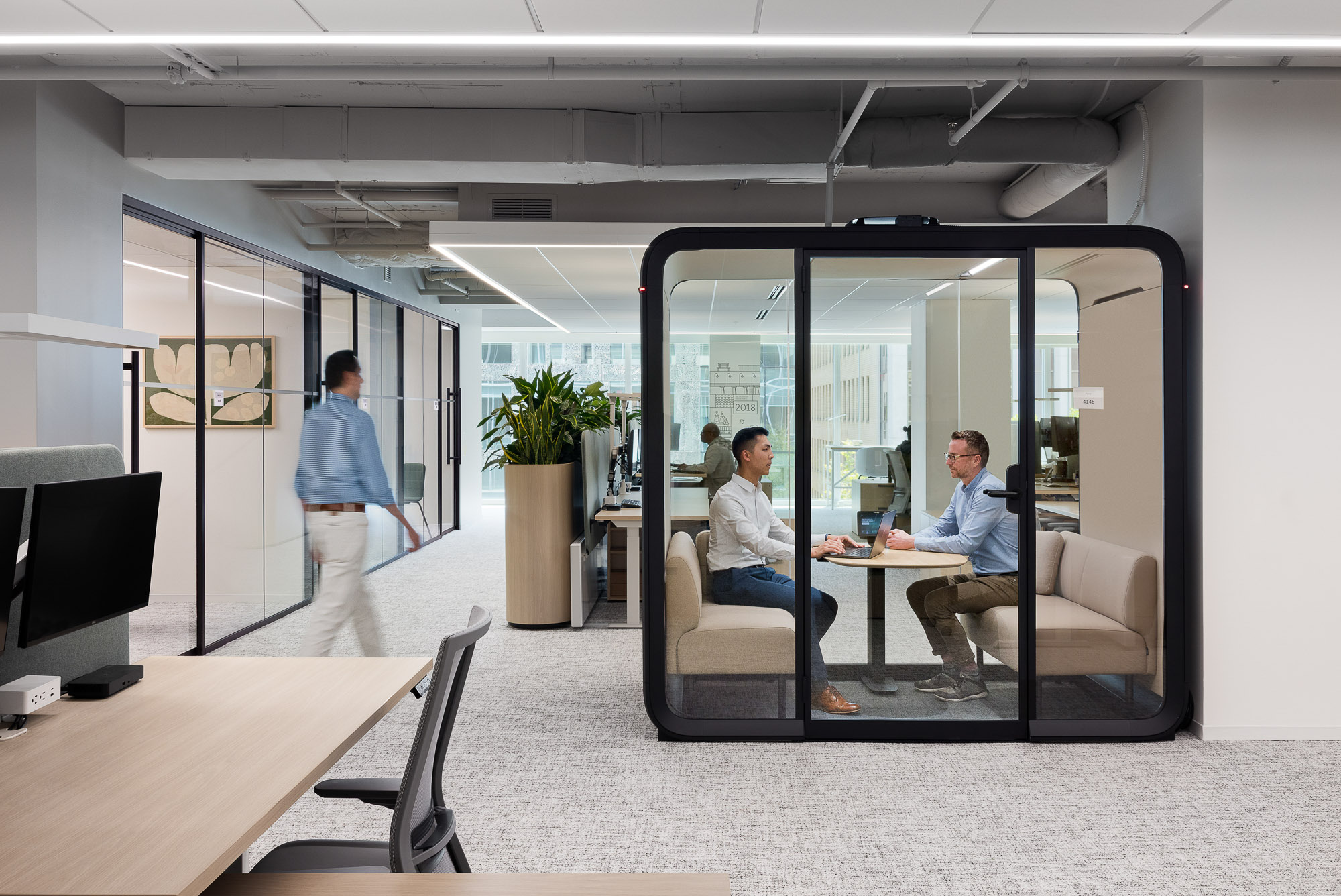 A group of people in a room.